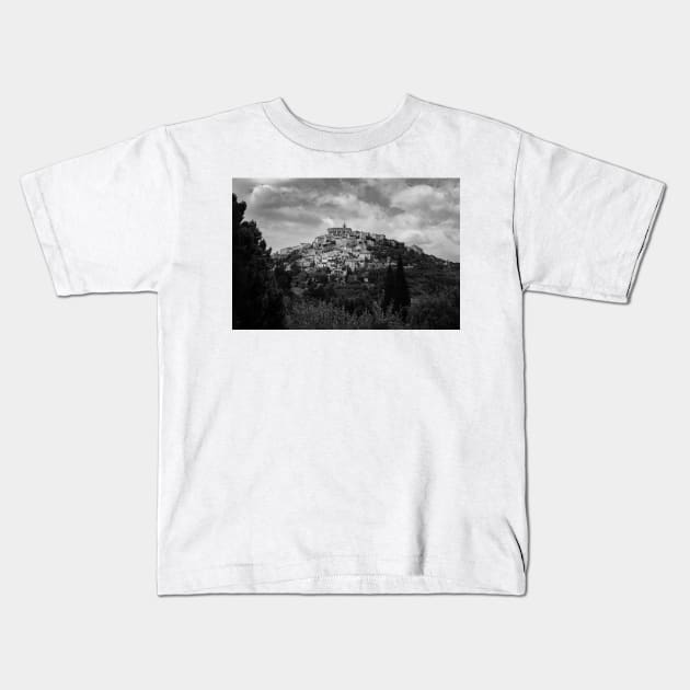 Traditional French hillside village in black and white Kids T-Shirt by brians101